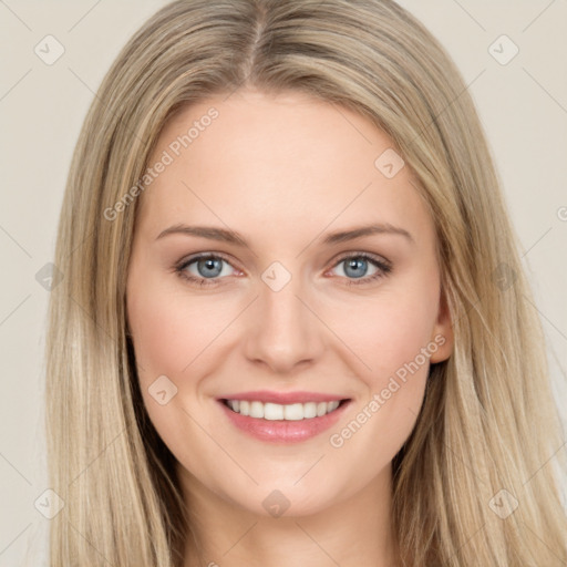 Joyful white young-adult female with long  brown hair and green eyes