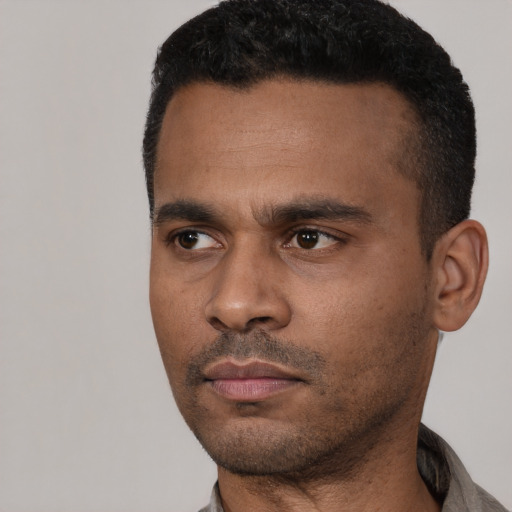 Neutral black young-adult male with short  black hair and brown eyes