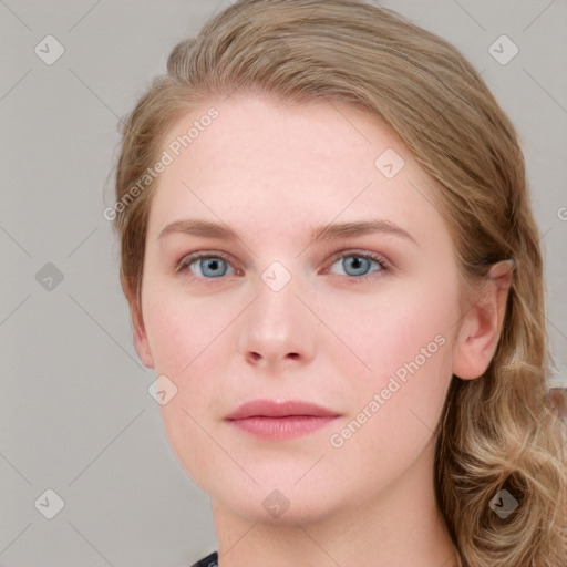 Joyful white young-adult female with short  brown hair and blue eyes