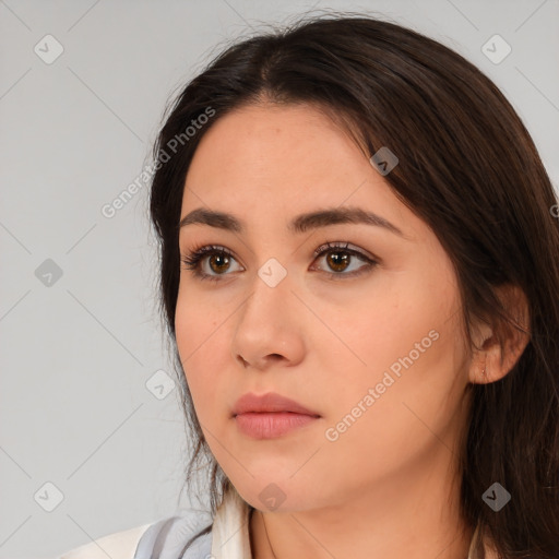 Neutral white young-adult female with medium  brown hair and brown eyes