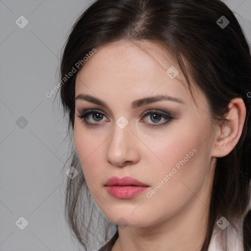 Neutral white young-adult female with long  brown hair and brown eyes