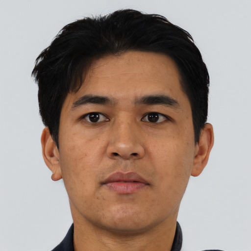 Neutral asian adult male with short  black hair and brown eyes