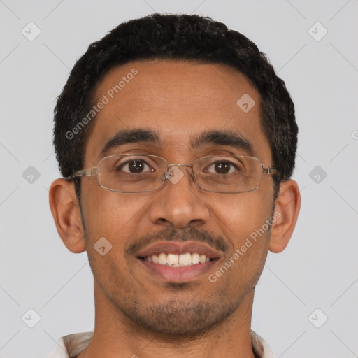 Joyful latino young-adult male with short  black hair and brown eyes