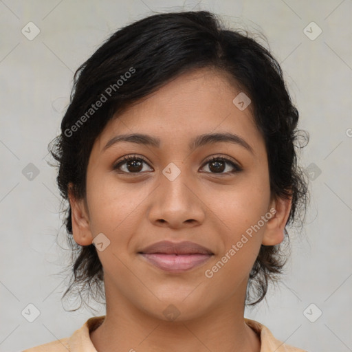 Joyful latino young-adult female with medium  brown hair and brown eyes