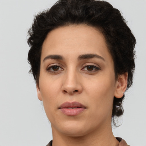 Neutral latino young-adult female with short  brown hair and brown eyes