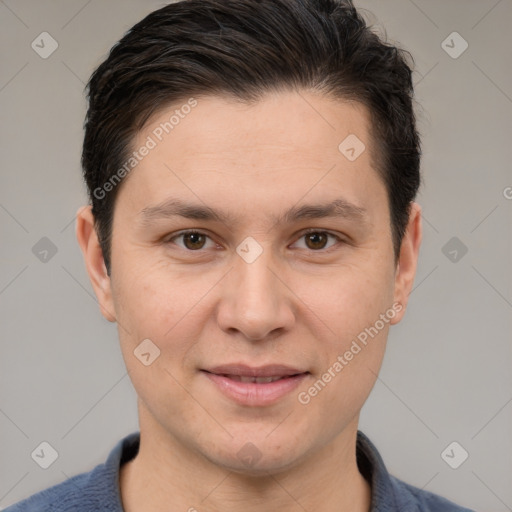 Joyful white adult male with short  brown hair and brown eyes