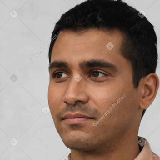 Neutral latino young-adult male with short  black hair and brown eyes