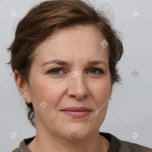 Joyful white adult female with medium  brown hair and grey eyes