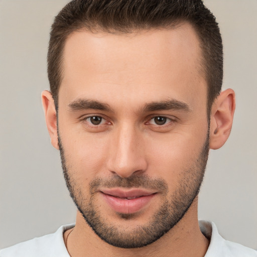 Joyful white young-adult male with short  brown hair and brown eyes