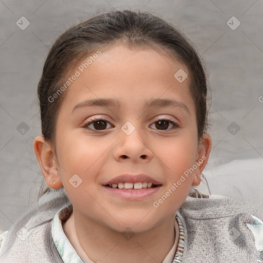 Joyful white child female with short  brown hair and brown eyes