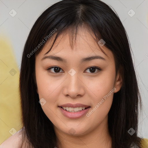 Joyful asian young-adult female with long  brown hair and brown eyes