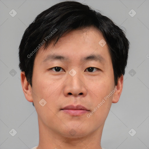 Neutral asian young-adult male with short  black hair and brown eyes