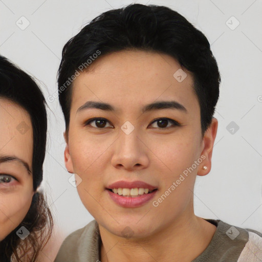 Joyful asian young-adult female with short  black hair and brown eyes