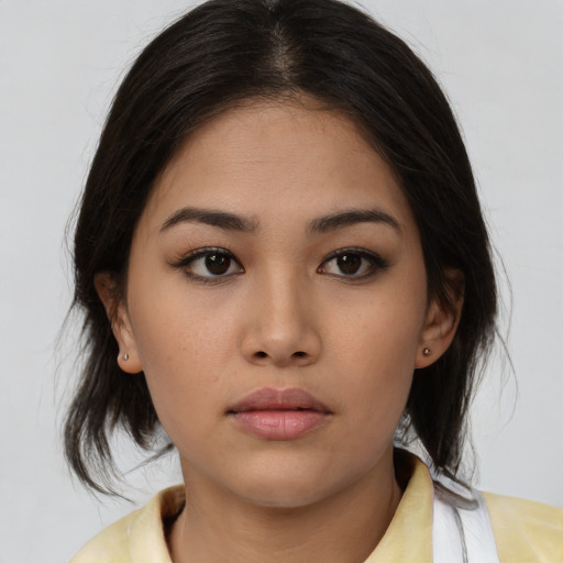 Neutral asian young-adult female with medium  brown hair and brown eyes