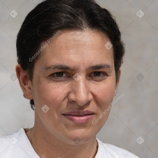 Joyful white adult female with short  brown hair and brown eyes