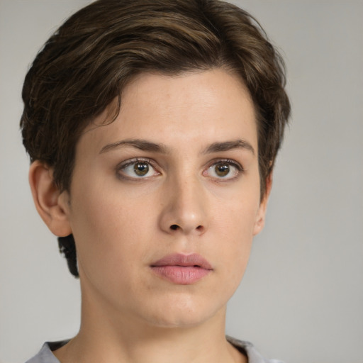 Neutral white young-adult female with short  brown hair and green eyes