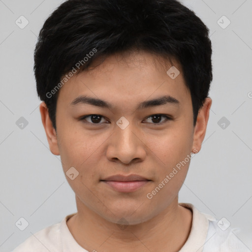 Joyful latino young-adult male with short  black hair and brown eyes