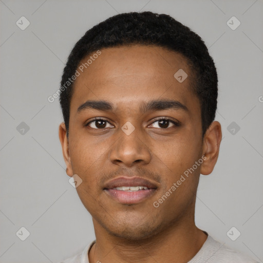 Joyful black young-adult male with short  black hair and brown eyes