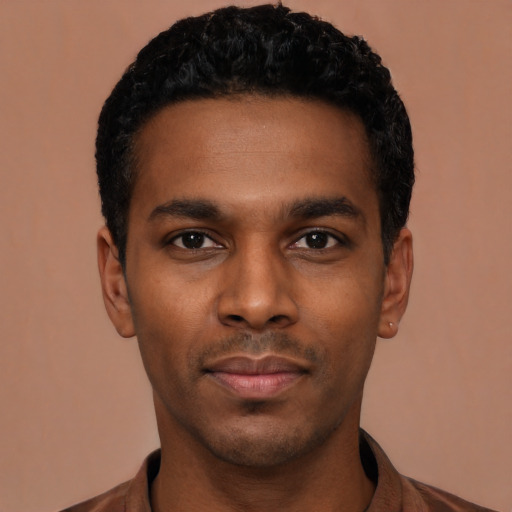 Neutral black young-adult male with short  black hair and brown eyes