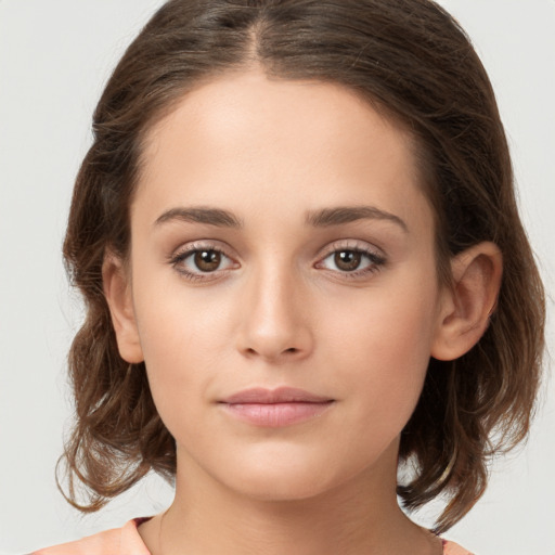 Neutral white young-adult female with medium  brown hair and brown eyes