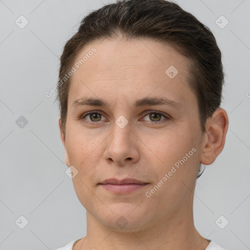 Joyful white young-adult female with short  brown hair and brown eyes