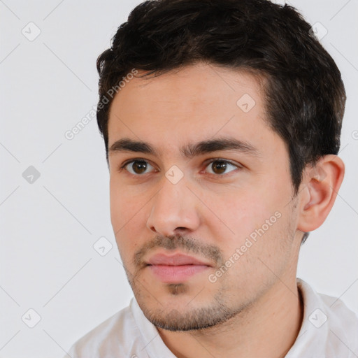 Neutral white young-adult male with short  black hair and brown eyes