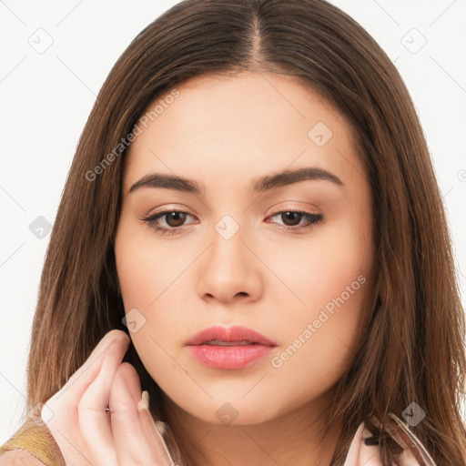 Neutral white young-adult female with long  brown hair and brown eyes