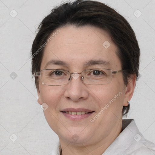 Joyful white adult female with short  brown hair and brown eyes