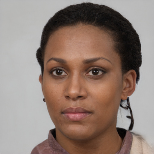 Neutral black young-adult female with short  brown hair and brown eyes