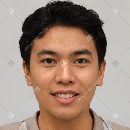 Joyful asian young-adult male with short  brown hair and brown eyes