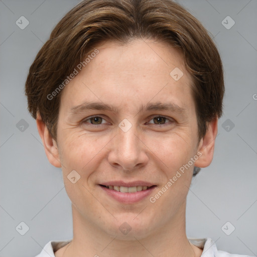 Joyful white adult female with short  brown hair and grey eyes