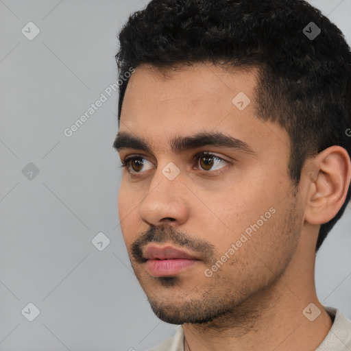 Neutral white young-adult male with short  black hair and brown eyes