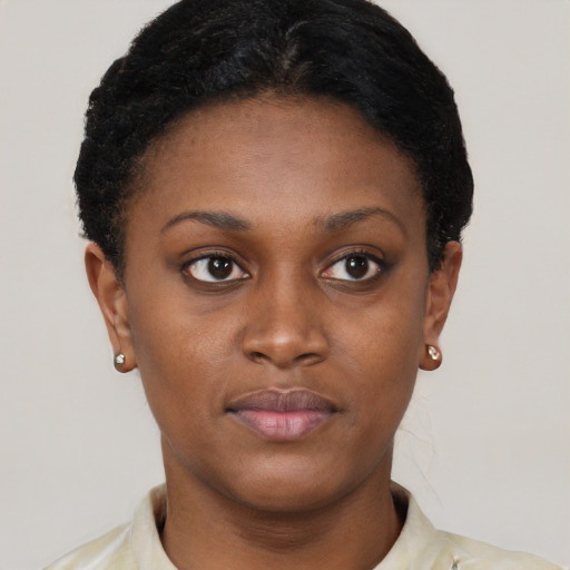 Neutral black young-adult female with short  brown hair and brown eyes