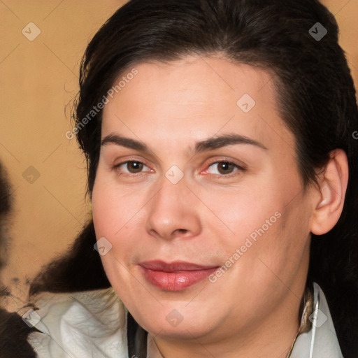 Joyful white adult female with medium  brown hair and brown eyes