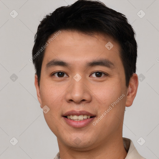 Joyful white young-adult male with short  black hair and brown eyes