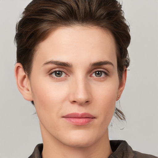 Neutral white young-adult female with short  brown hair and grey eyes