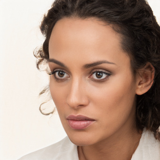 Neutral white young-adult female with medium  brown hair and brown eyes