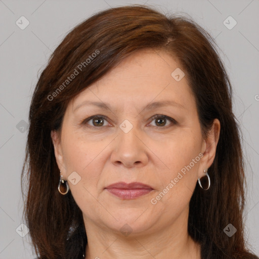 Joyful white adult female with medium  brown hair and brown eyes