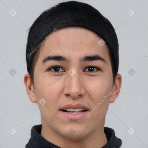 Joyful asian young-adult male with short  black hair and brown eyes