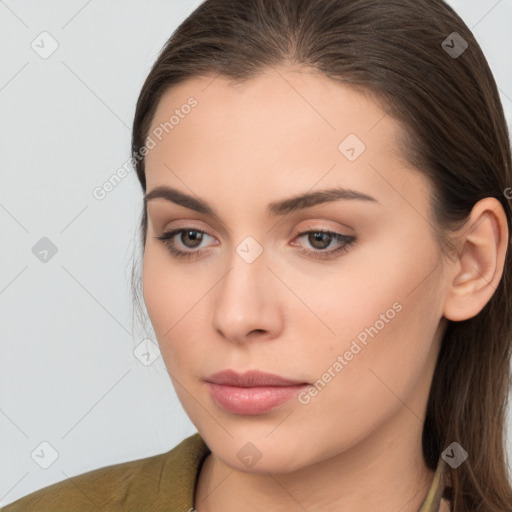 Neutral white young-adult female with long  brown hair and brown eyes