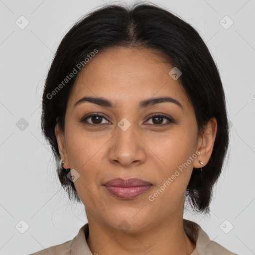 Joyful latino young-adult female with medium  brown hair and brown eyes