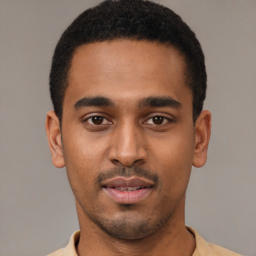Neutral black young-adult male with short  black hair and brown eyes