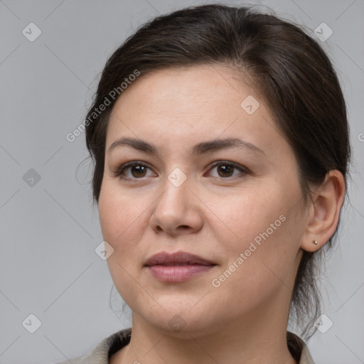 Joyful white young-adult female with medium  brown hair and brown eyes