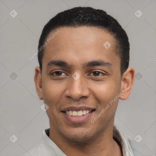 Joyful latino young-adult male with short  black hair and brown eyes