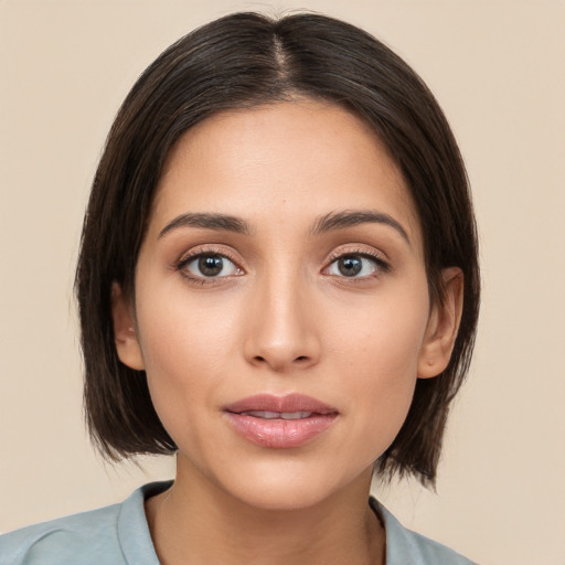 Neutral white young-adult female with medium  brown hair and brown eyes