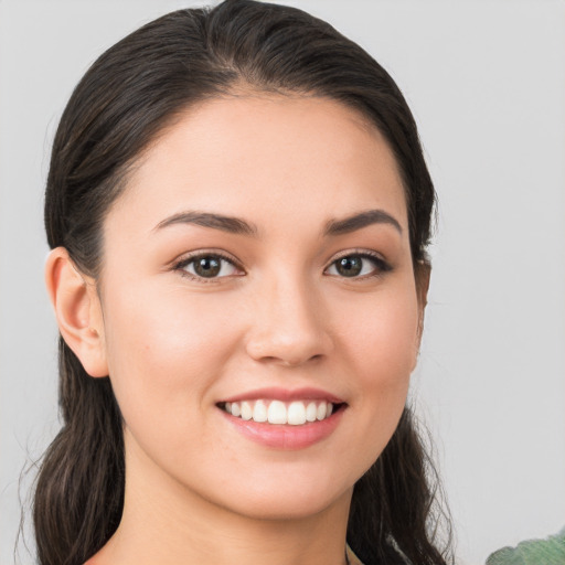 Joyful white young-adult female with medium  brown hair and brown eyes