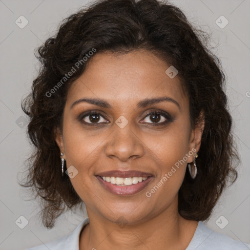 Joyful black young-adult female with medium  brown hair and brown eyes