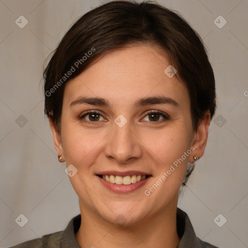 Joyful white young-adult female with medium  brown hair and brown eyes