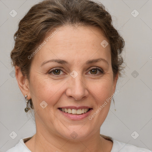 Joyful white adult female with short  brown hair and brown eyes