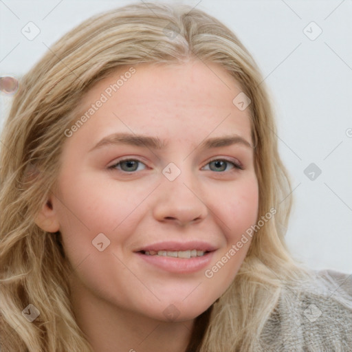 Joyful white young-adult female with medium  brown hair and blue eyes